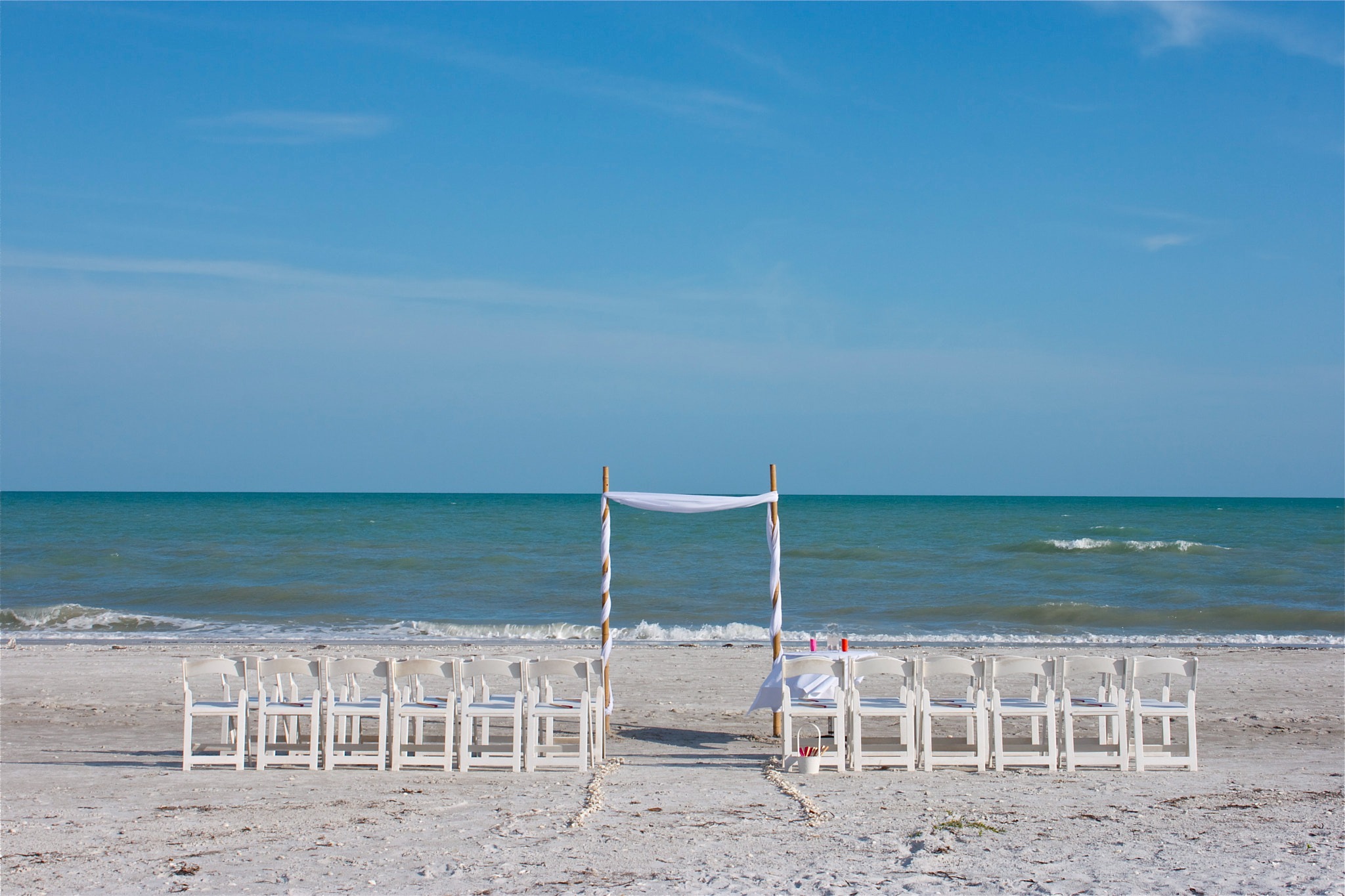 Unity sand ceremony setup on the beach